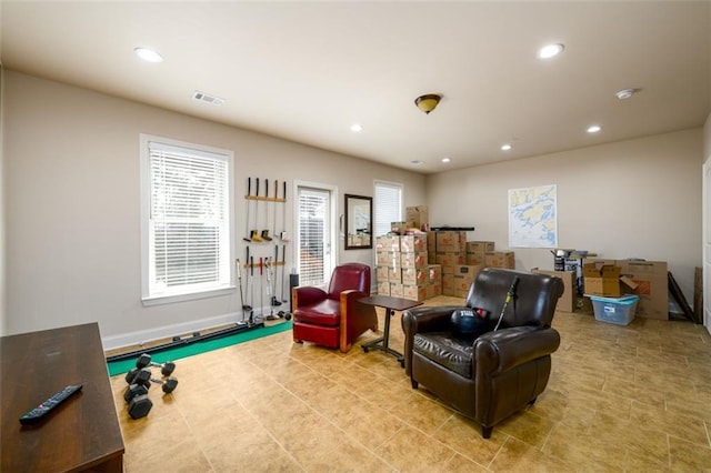 sitting room featuring baseboards, tile patterned flooring, visible vents, and recessed lighting