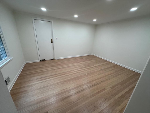 6542 Cherry Tree Ln, Atlanta, GA 30328 - empty room featuring light wood-style floors and recessed lighting