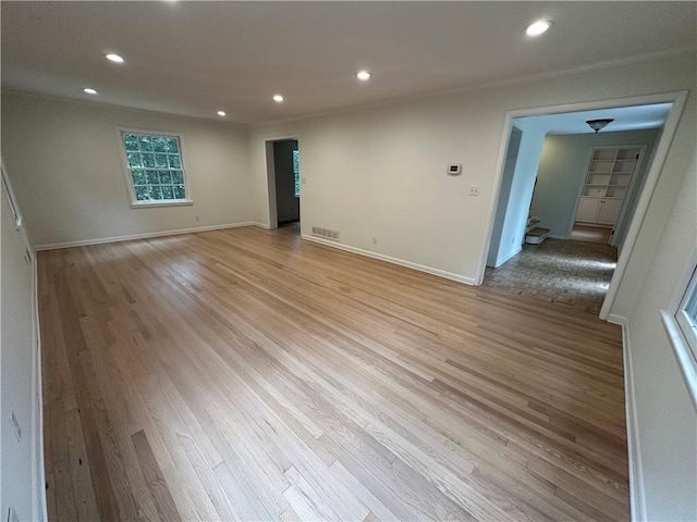 6542 Cherry Tree Ln, Atlanta, GA 30328 - spare room with recessed lighting and light wood-style flooring