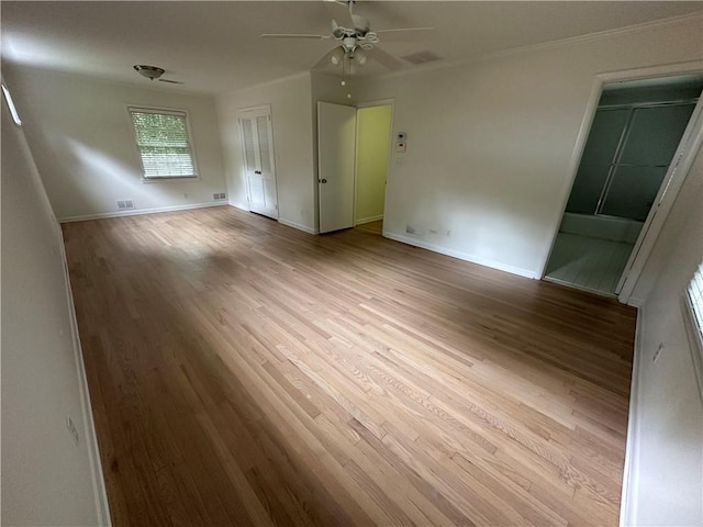 6542 Cherry Tree Ln, Atlanta, GA 30328 - spare room with ceiling fan, wood finished floors, and ornamental molding