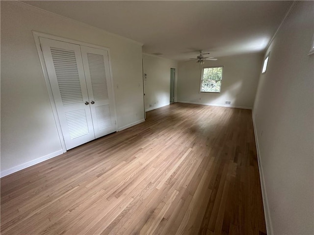 6542 Cherry Tree Ln, Atlanta, GA 30328 - unfurnished living room with wood finished floors and a ceiling fan