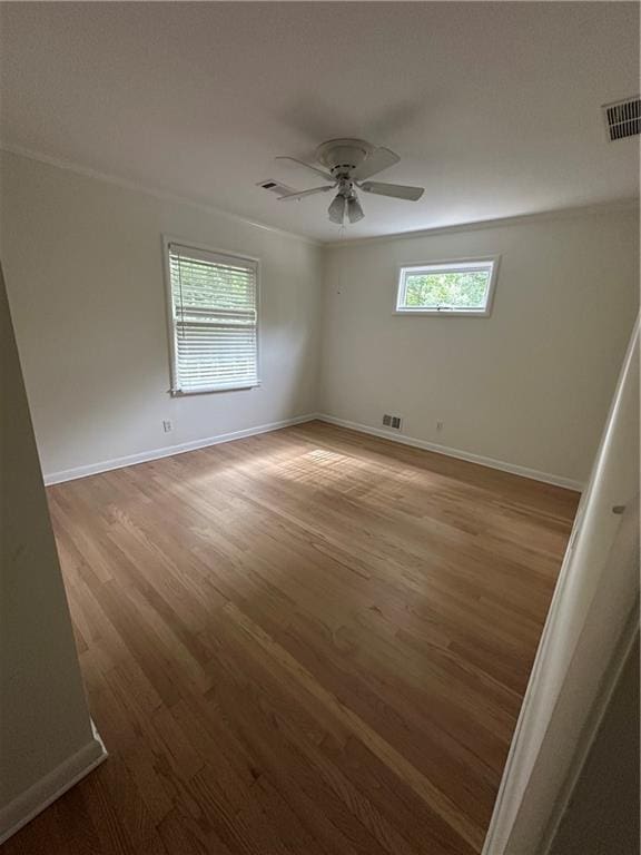 6542 Cherry Tree Ln, Atlanta, GA 30328 - empty room featuring wood finished floors and ceiling fan