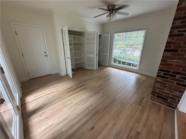 6542 Cherry Tree Ln, Atlanta, GA 30328 - unfurnished bedroom featuring light wood finished floors, ornamental molding, and ceiling fan