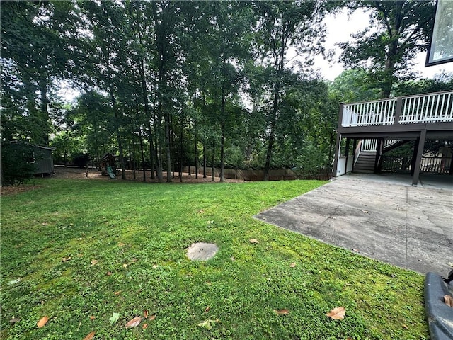 6542 Cherry Tree Ln, Atlanta, GA 30328 - view of yard featuring stairway, a deck, and a patio