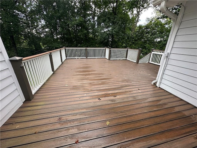 6542 Cherry Tree Ln, Atlanta, GA 30328 - wooden deck featuring view of wooded area