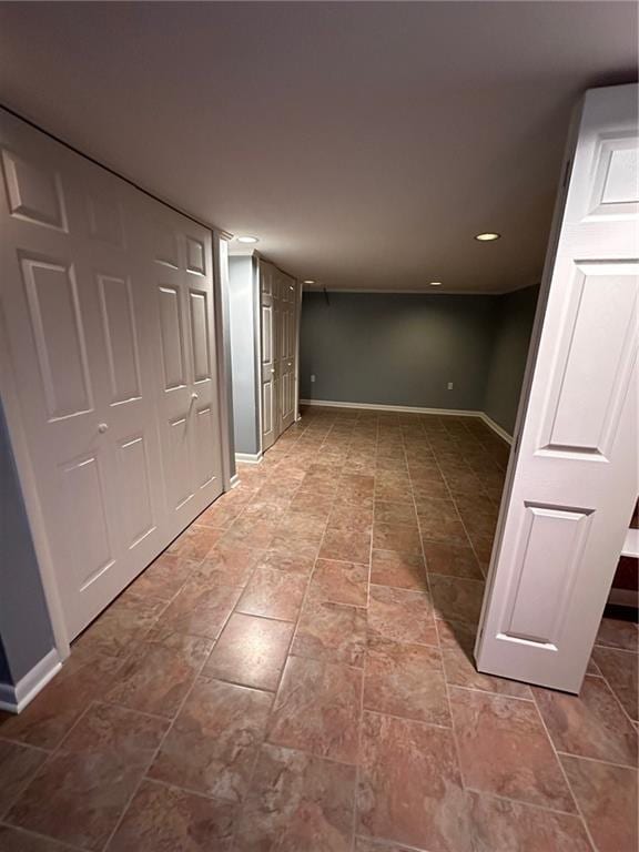 finished basement featuring baseboards