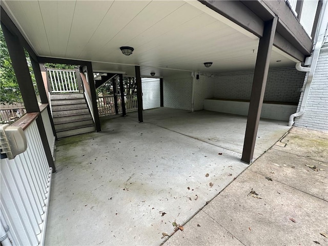 6542 Cherry Tree Ln, Atlanta, GA 30328 - view of patio with an attached carport and stairway