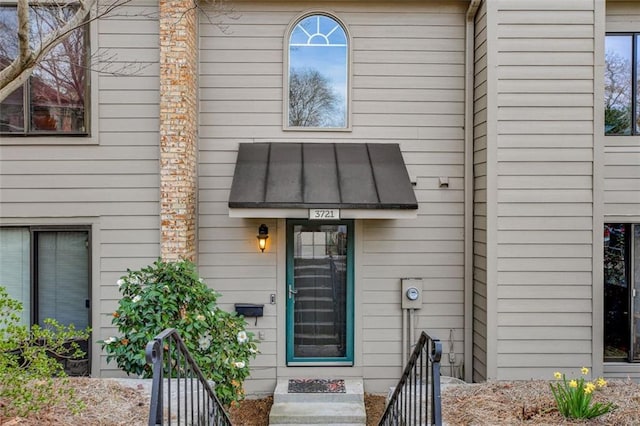 property entrance with a standing seam roof