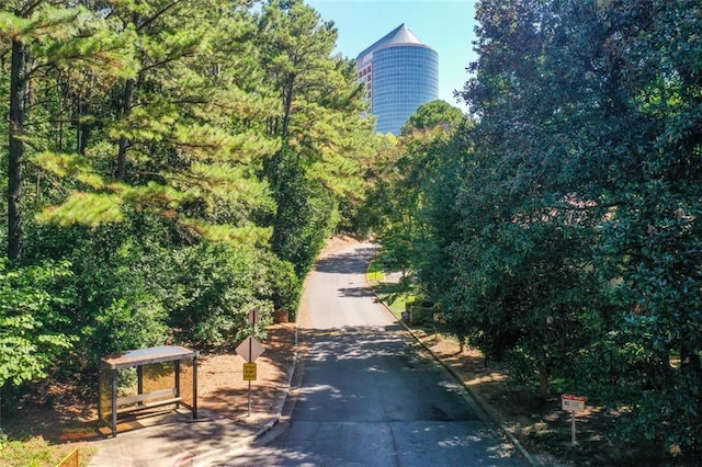 3721 Stonewall Cir SE, Atlanta, GA 30339 - view of asphalt street with traffic signs and curbs