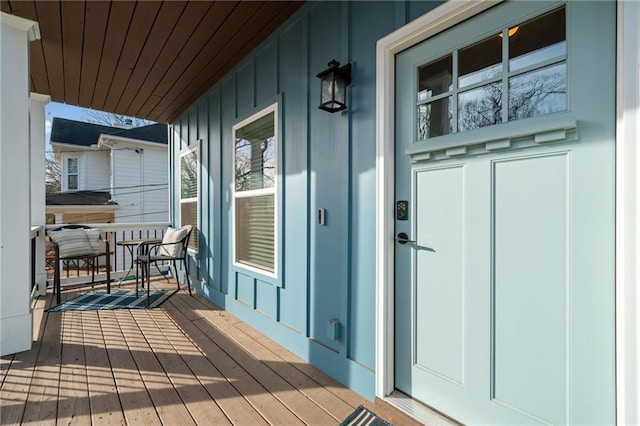 doorway to property featuring a porch