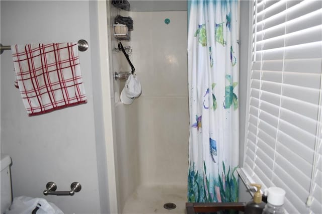 bathroom with a shower with curtain