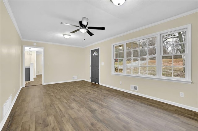 interior space featuring hardwood / wood-style floors, crown molding, and ceiling fan