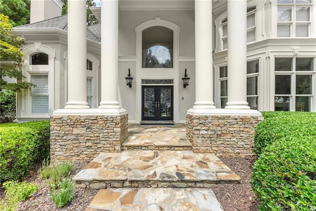 property entrance featuring french doors