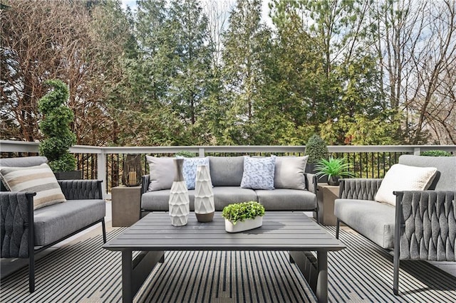 wooden deck featuring an outdoor hangout area