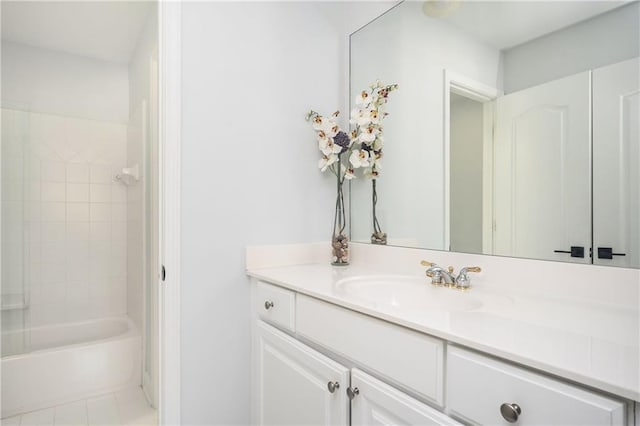 bathroom featuring shower / bath combination, vanity, and tile patterned flooring