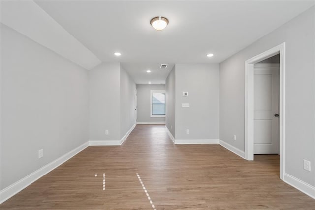 empty room featuring light hardwood / wood-style floors