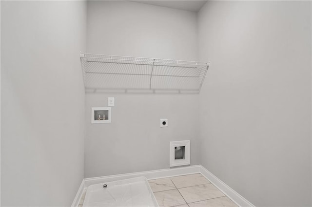 washroom with hookup for a washing machine, electric dryer hookup, and light tile patterned flooring