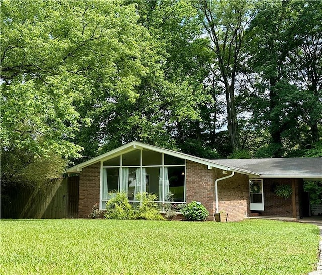 115 Don Rich Dr, Carrollton, GA 30117 - view of front of home with brick siding and an attached carport