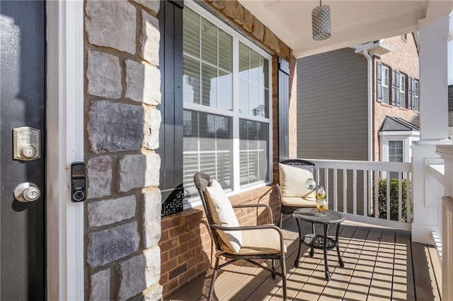 balcony featuring covered porch