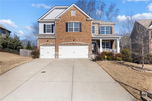 view of front of property with a porch, an attached garage, brick siding, fence, and concrete driveway