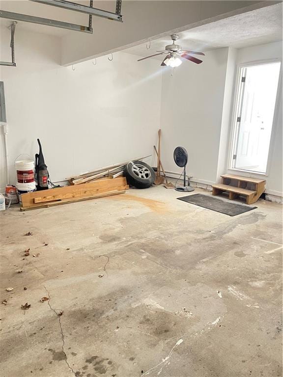 203 Sea Marsh Ct, Fayetteville, GA 30215 - garage featuring a ceiling fan