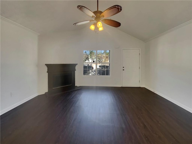 unfurnished living room featuring dark wood-style floors, a fireplace with raised hearth, and baseboards