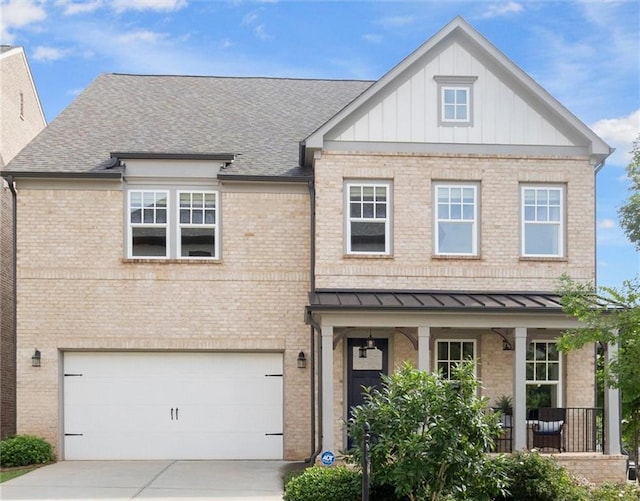 635 Opera Ln, Alpharetta, GA 30009 - view of front facade with covered porch, brick siding, and an attached garage