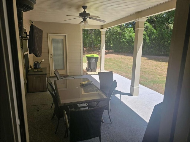 124 Archstone Sq, Mcdonough, GA 30253 - view of patio featuring ceiling fan and outdoor dining area