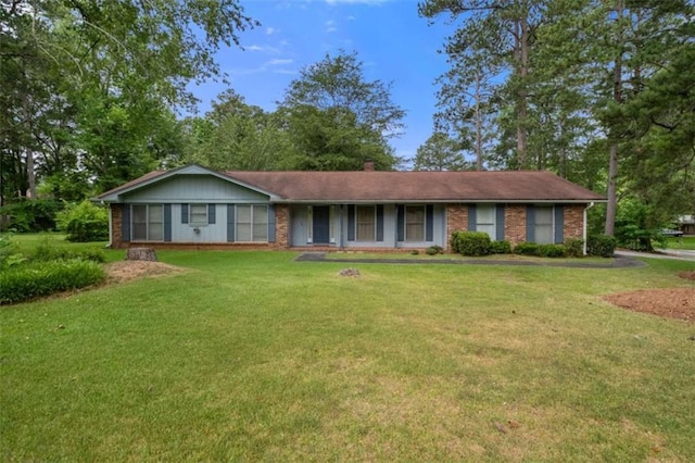 ranch-style home with a front yard