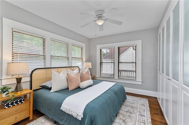 628 Home Ave SE, Atlanta, GA 30312 - bedroom with wood finished floors, baseboards, and a ceiling fan