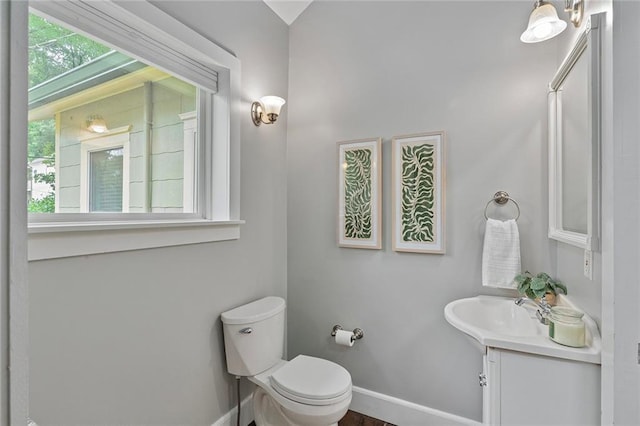 628 Home Ave SE, Atlanta, GA 30312 - half bath with vanity, toilet, and baseboards