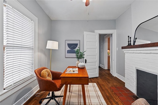 628 Home Ave SE, Atlanta, GA 30312 - office space featuring baseboards, wood finished floors, a ceiling fan, and a fireplace
