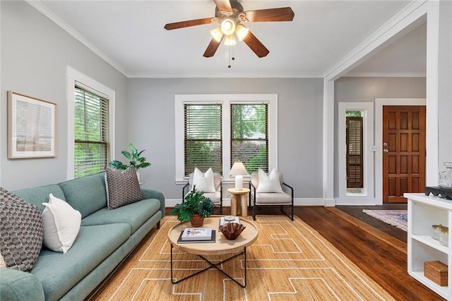 628 Home Ave SE, Atlanta, GA 30312 - living room featuring wood finished floors, plenty of natural light, ornamental molding, a ceiling fan, and baseboards