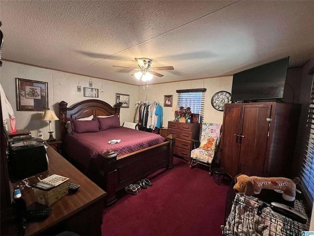 bedroom with dark carpet, a textured ceiling, and ceiling fan
