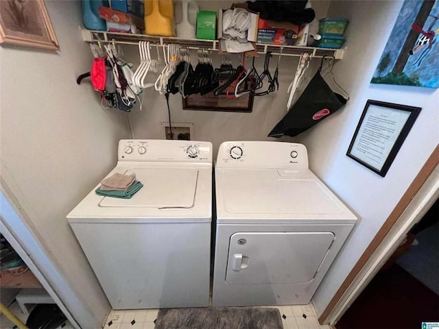 laundry area featuring independent washer and dryer