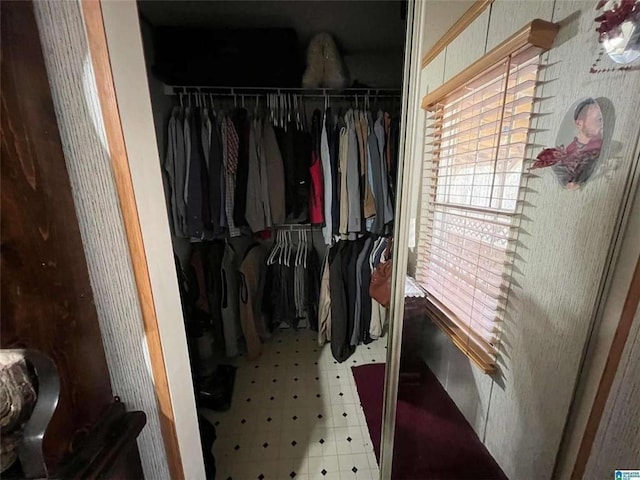 spacious closet featuring tile patterned floors