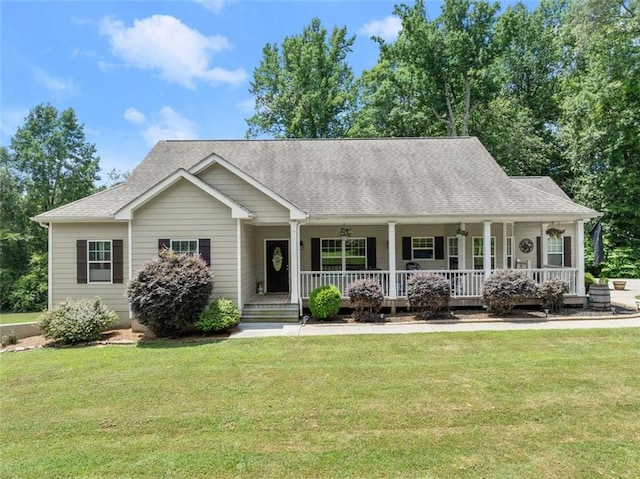 view of front of home with a front lawn and a porch