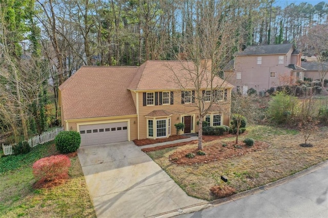 colonial-style house with a garage