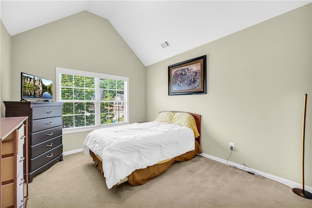 bedroom featuring baseboards, light carpet, vaulted ceiling, and visible vents