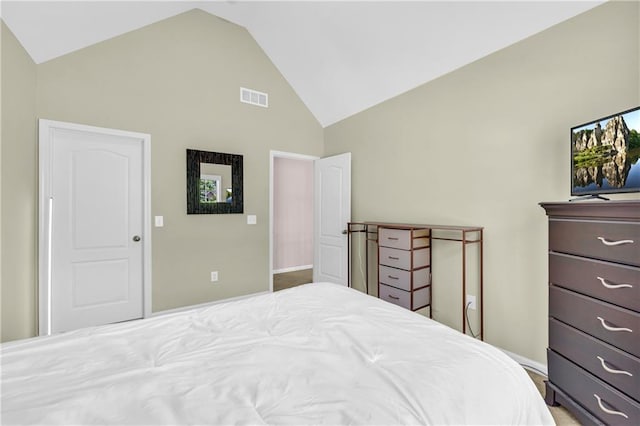 bedroom with high vaulted ceiling, visible vents, and baseboards