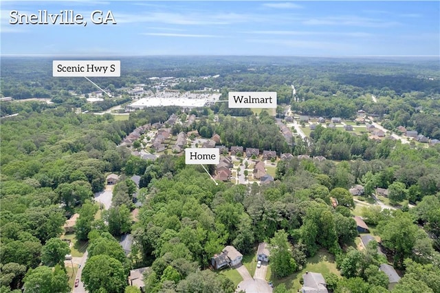 bird's eye view with a forest view