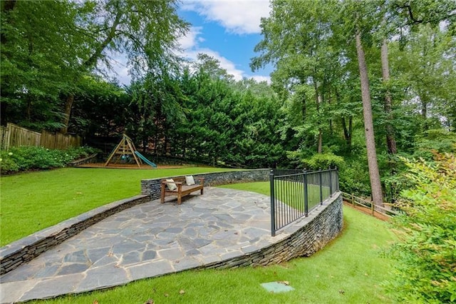 view of patio featuring a playground