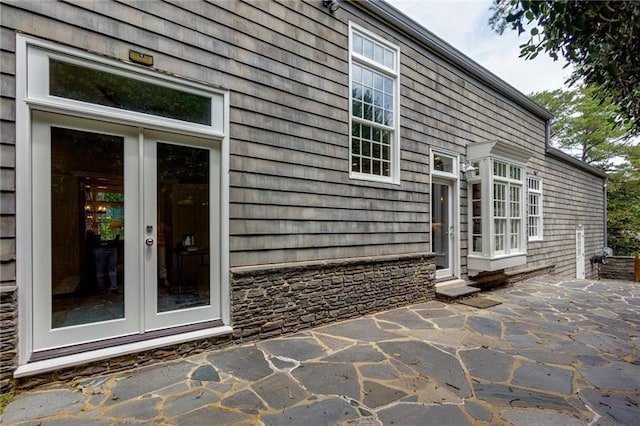 exterior space featuring french doors and a patio area