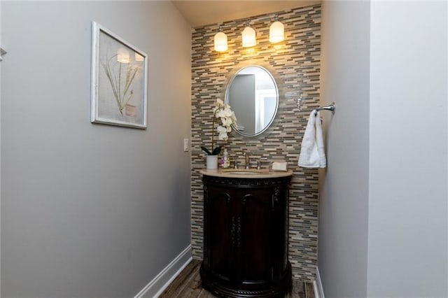 bathroom featuring vanity and hardwood / wood-style flooring