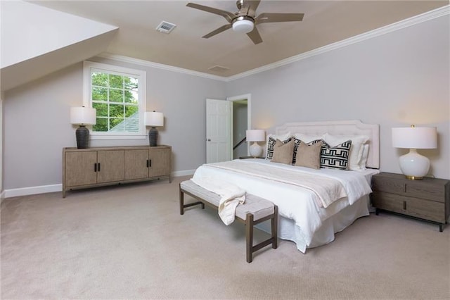 carpeted bedroom featuring vaulted ceiling, ceiling fan, and crown molding