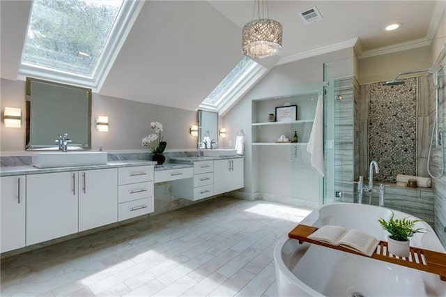 bathroom featuring vanity, lofted ceiling with skylight, crown molding, an inviting chandelier, and independent shower and bath