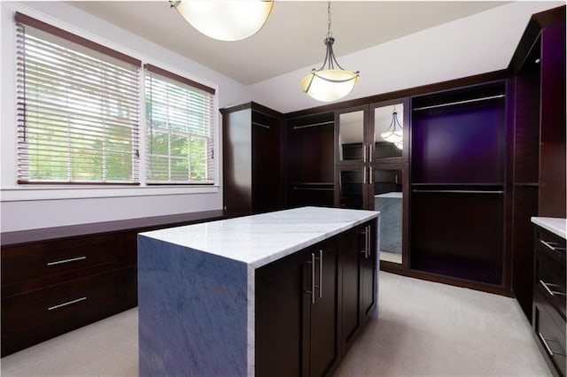 kitchen featuring pendant lighting and a center island