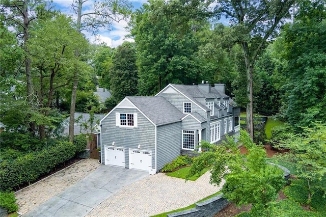 view of side of property featuring a garage