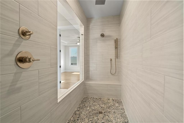 bathroom featuring a tile shower