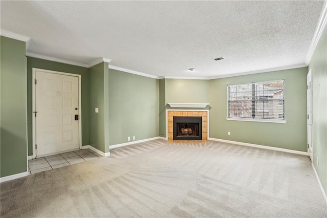 511 Barrington Hills Dr, Atlanta, GA 30350 - unfurnished living room with carpet floors, ornamental molding, a fireplace, baseboards, and a textured ceiling